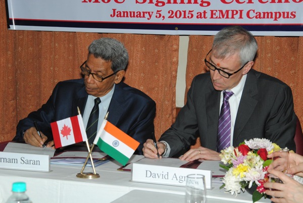 Mr. Gurnam Saran, President, EMPI and Mr. David Agnew, President, Seneca College, Canada signing the MoU